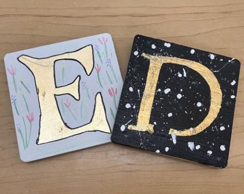 text 'E' on a white background and 'D' on a black background