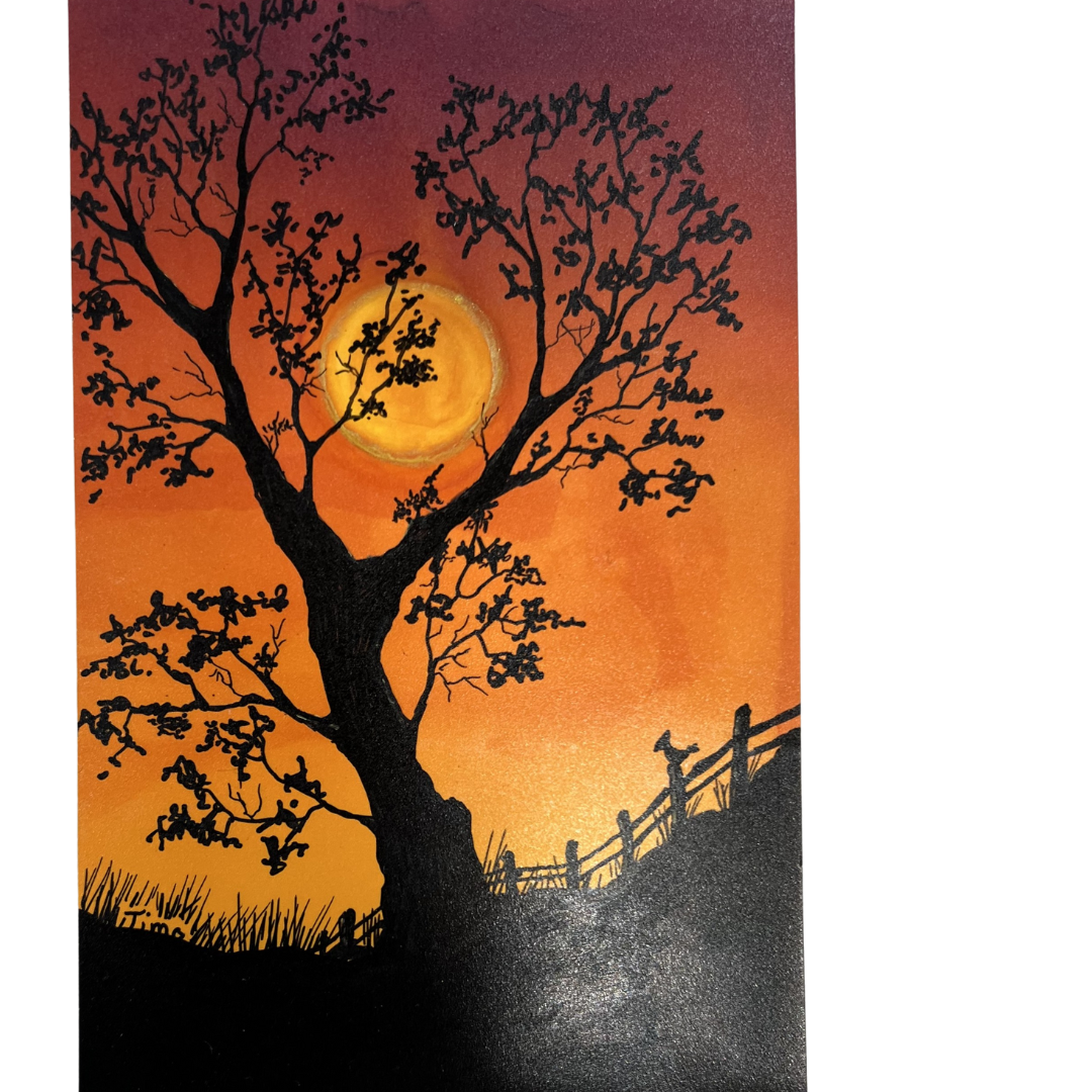 tree  silhouette on orange sunset background