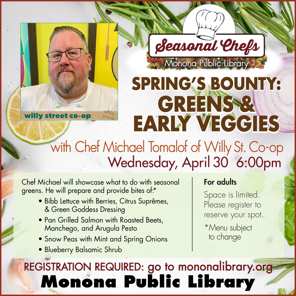 Chef Michael with a green menu and veggie background